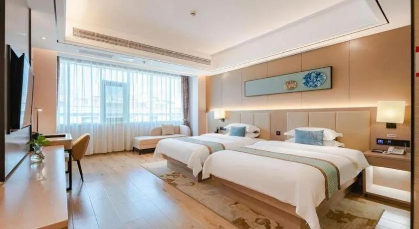 Bed in GreenTree Eastern Dali Railway Station Hotel