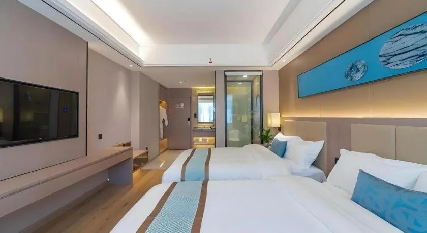 Bed in GreenTree Eastern Dali Railway Station Hotel