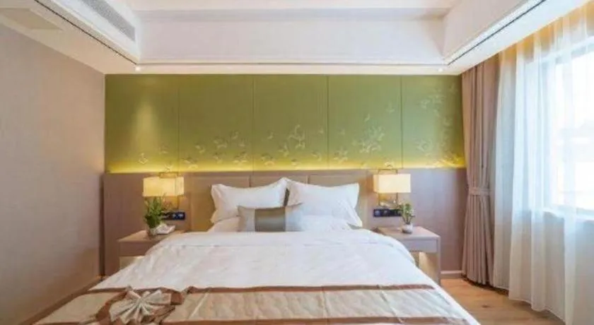 Bed in GreenTree Eastern Dali Railway Station Hotel