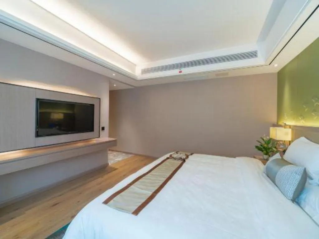 Bed in GreenTree Eastern Dali Railway Station Hotel