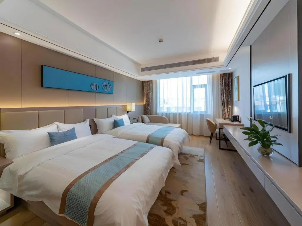 Bed in GreenTree Eastern Dali Railway Station Hotel