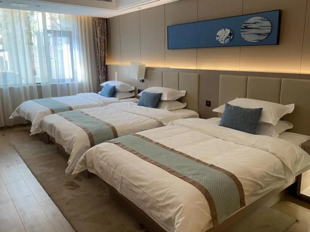 Bed in GreenTree Eastern Dali Railway Station Hotel