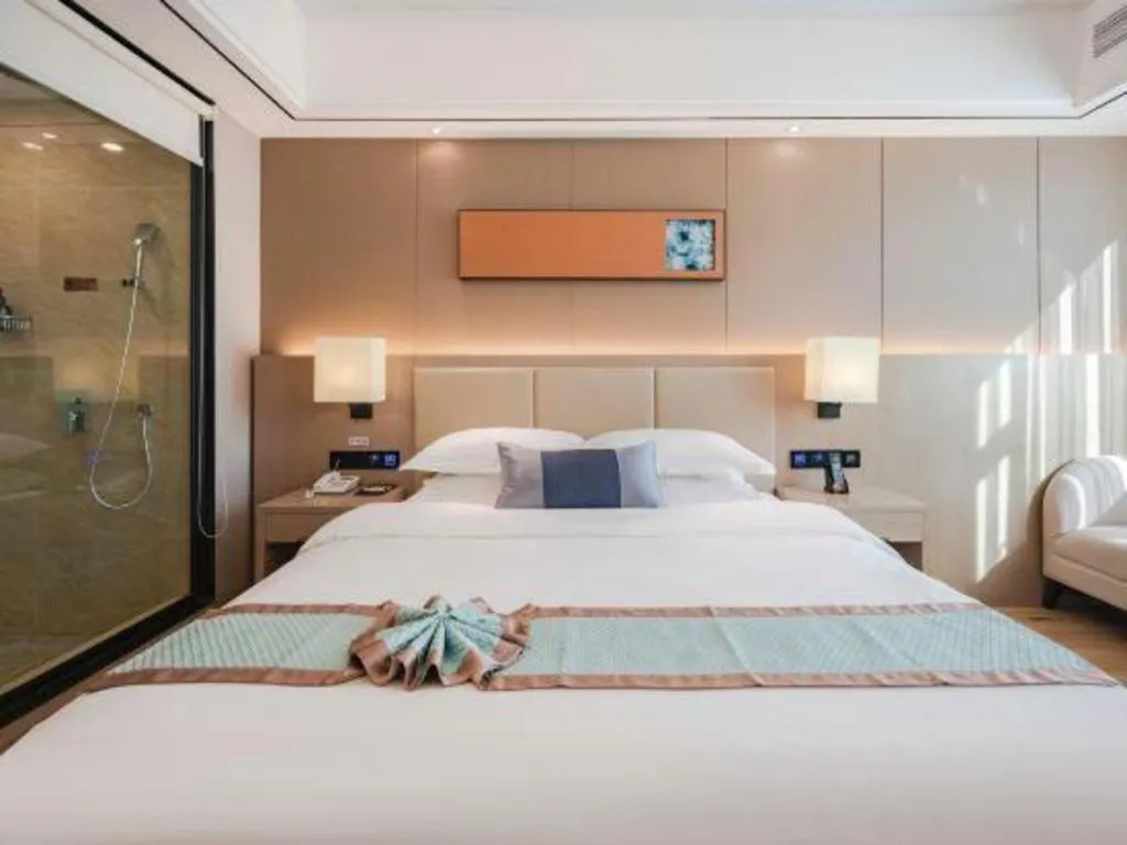 Bed in GreenTree Eastern Dali Railway Station Hotel