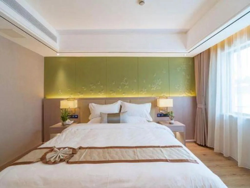 Bed in GreenTree Eastern Dali Railway Station Hotel