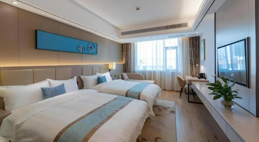 Bed in GreenTree Eastern Dali Railway Station Hotel