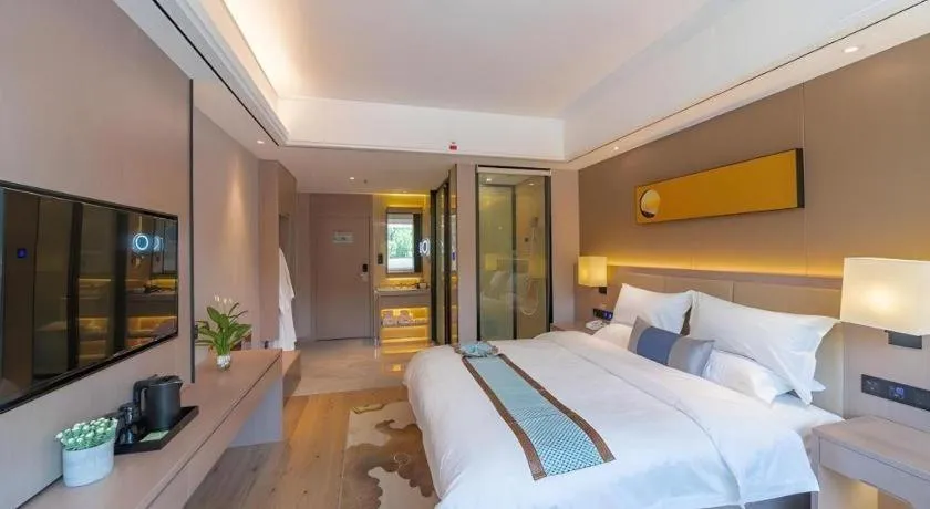 Bed in GreenTree Eastern Dali Railway Station Hotel