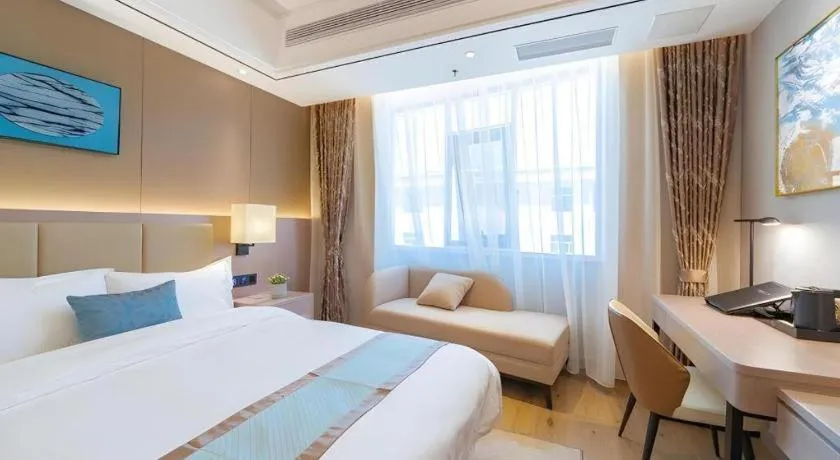 Bed in GreenTree Eastern Dali Railway Station Hotel