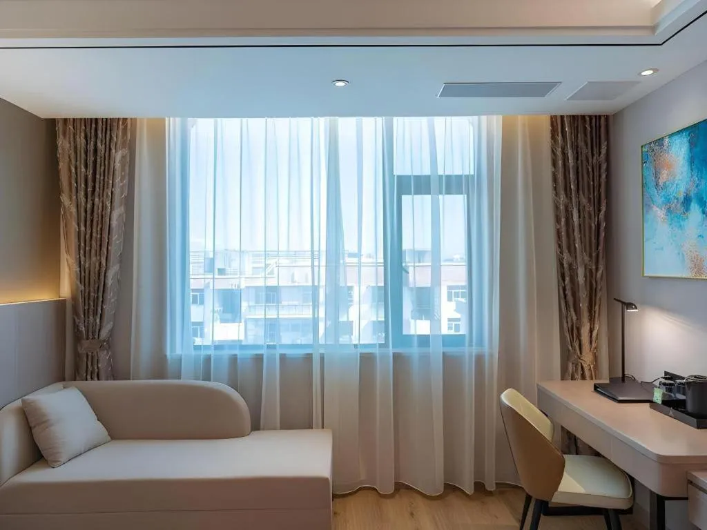 Bed in GreenTree Eastern Dali Railway Station Hotel