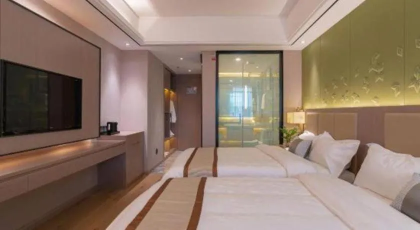 Bed in GreenTree Eastern Dali Railway Station Hotel