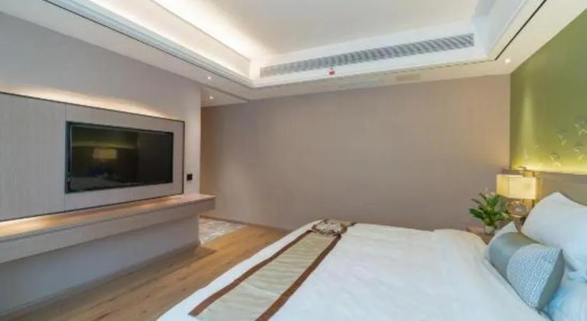 Bed in GreenTree Eastern Dali Railway Station Hotel