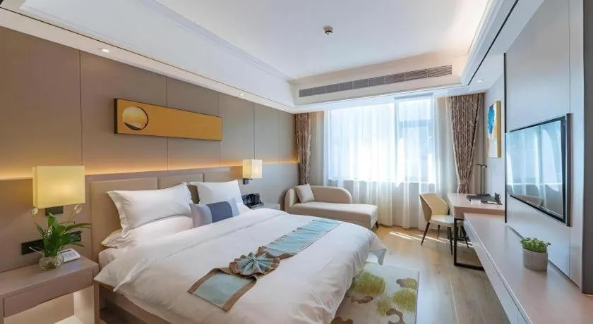 Bed in GreenTree Eastern Dali Railway Station Hotel