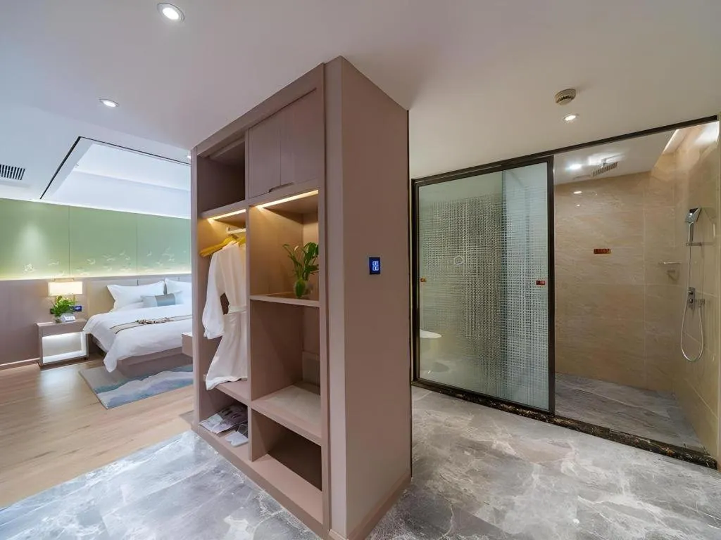 Bed in GreenTree Eastern Dali Railway Station Hotel