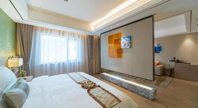 Bed in GreenTree Eastern Dali Railway Station Hotel