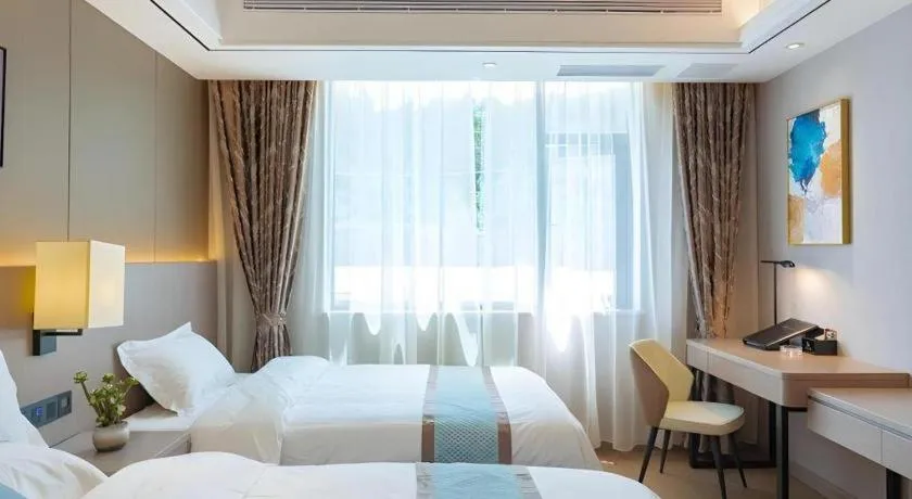 Bed in GreenTree Eastern Dali Railway Station Hotel