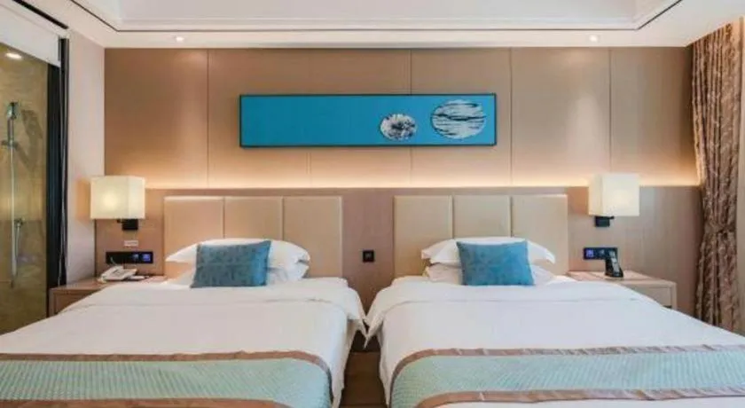 Bed in GreenTree Eastern Dali Railway Station Hotel