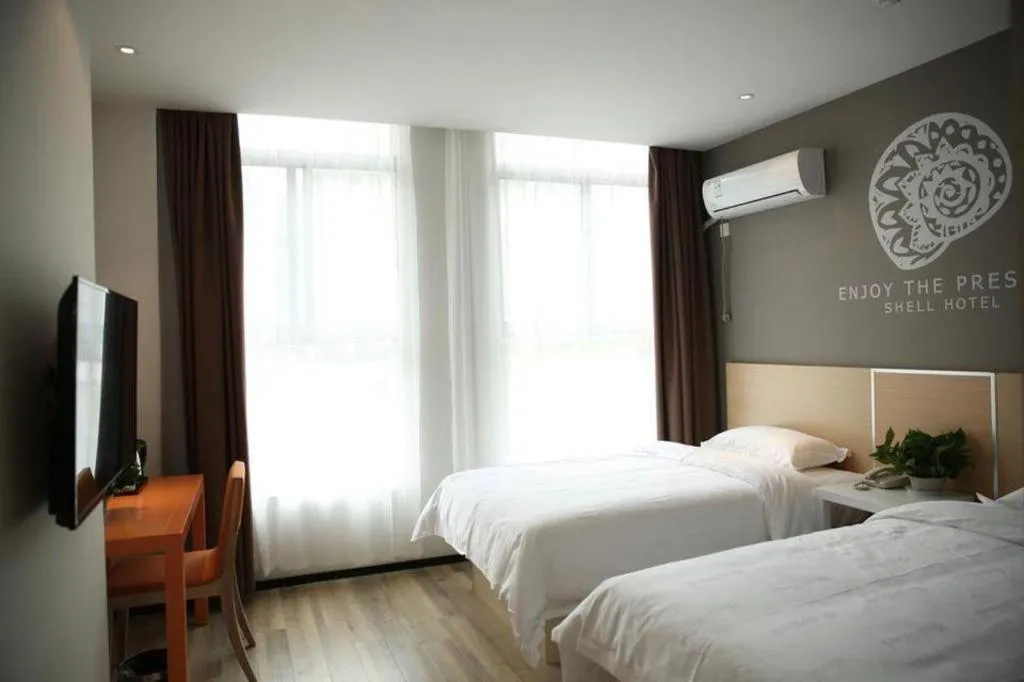 Bed in Shell Nanjing Jiangning District University City Hotel