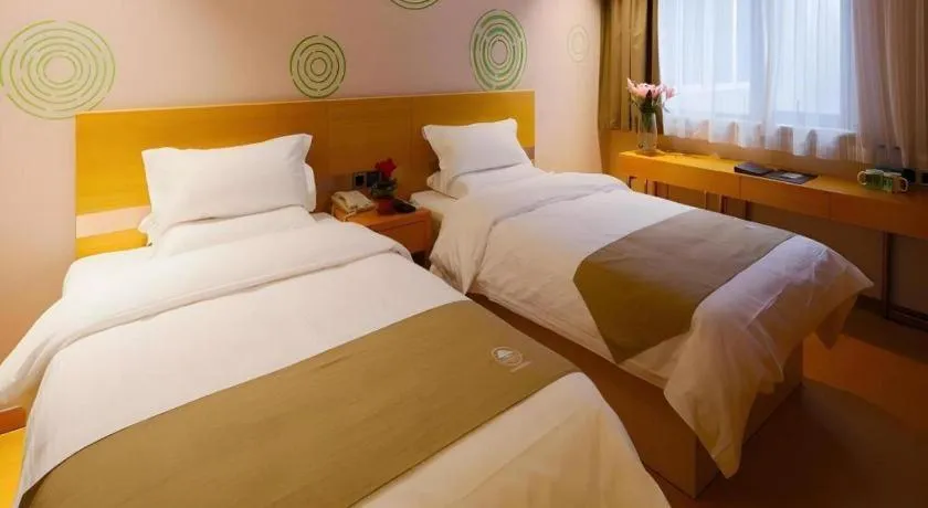 Bed in GreenTree Inn Shanghai Railway Station Macao Road