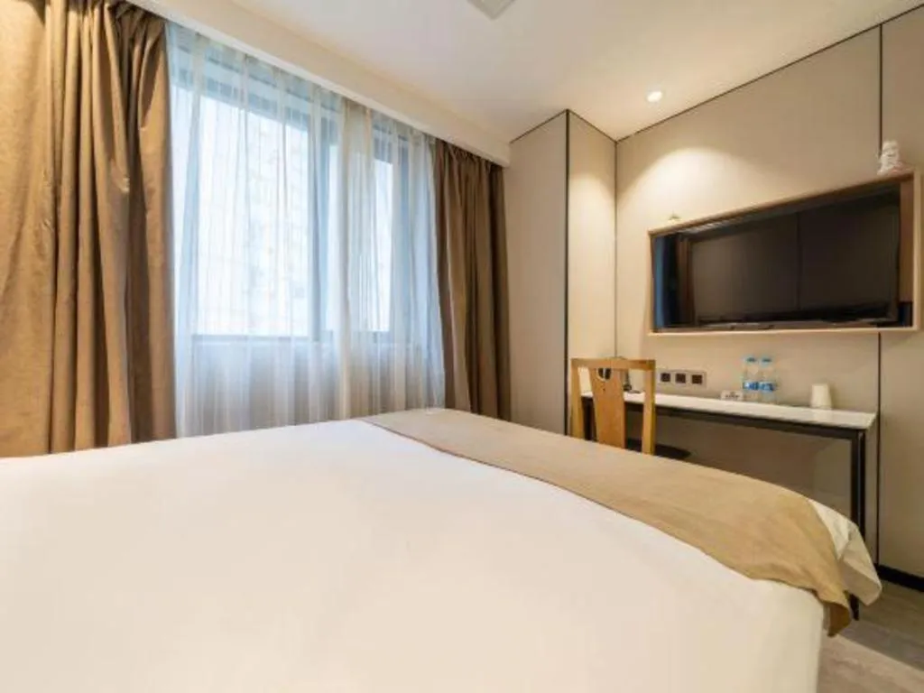 Bed in GreenTree Inn Shanghai Railway Station Macao Road