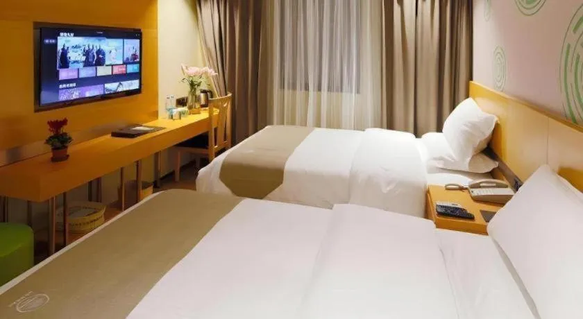Bed in GreenTree Inn Shanghai Railway Station Macao Road