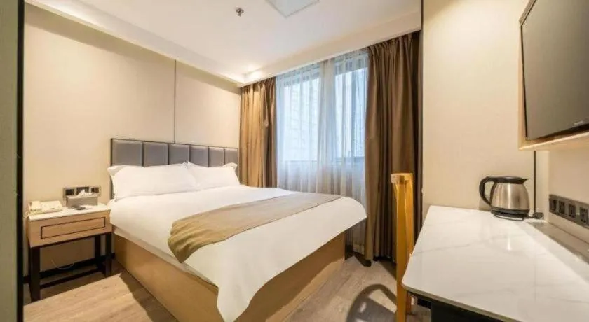 Bed in GreenTree Inn Shanghai Railway Station Macao Road