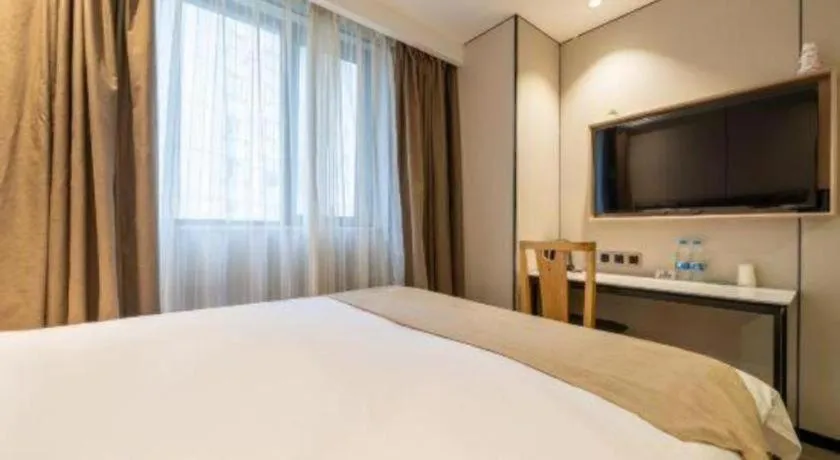 Bed in GreenTree Inn Shanghai Railway Station Macao Road