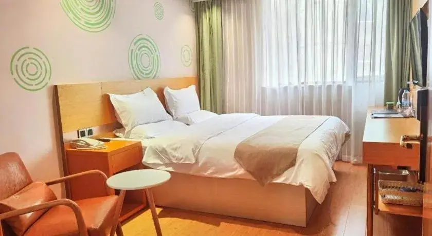 Bed in GreenTree Inn Shanghai Railway Station Macao Road Bed in GreenTree Inn Shanghai Railway Station Macao Road