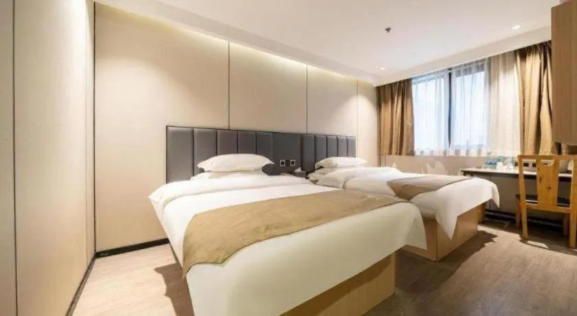 Bed in GreenTree Inn Shanghai Railway Station Macao Road