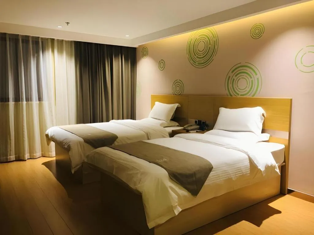 Bed in GreenTree Inn Shanghai Railway Station Macao Road