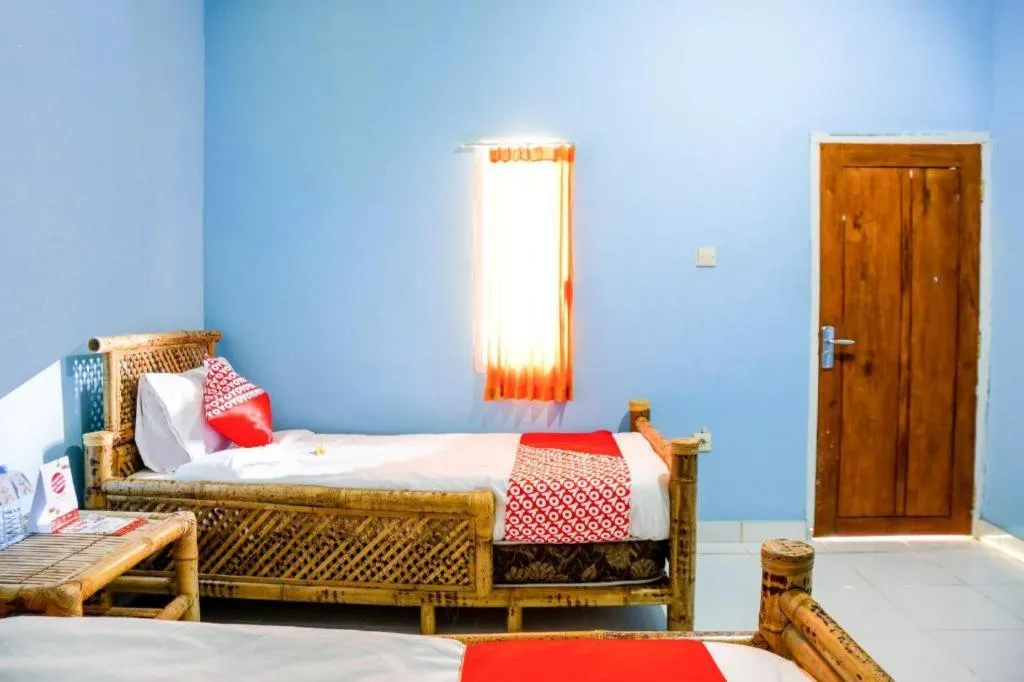 Bed in OYO 1662 Zury Homestay
