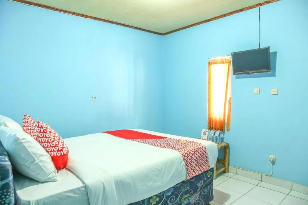 Bed in OYO 1662 Zury Homestay