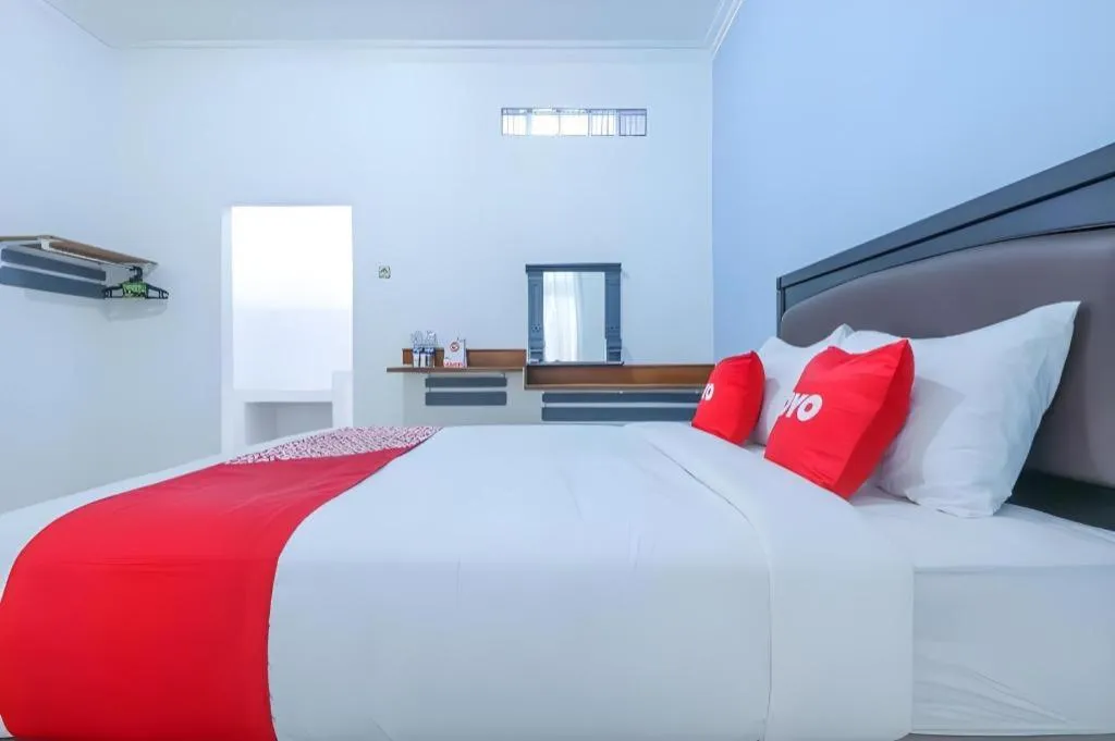 Bed in OYO 1755 De'balcon Accomodation Near Ngurah Rai Airport