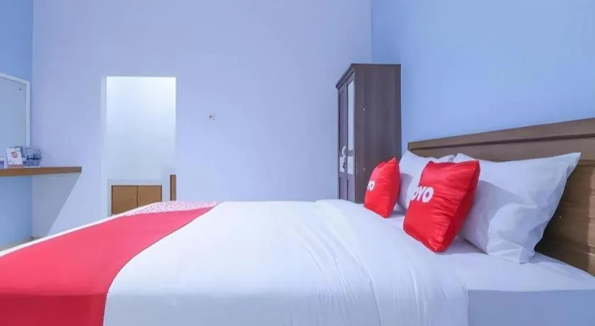 Bed in OYO 1755 De'balcon Accomodation Near Ngurah Rai Airport