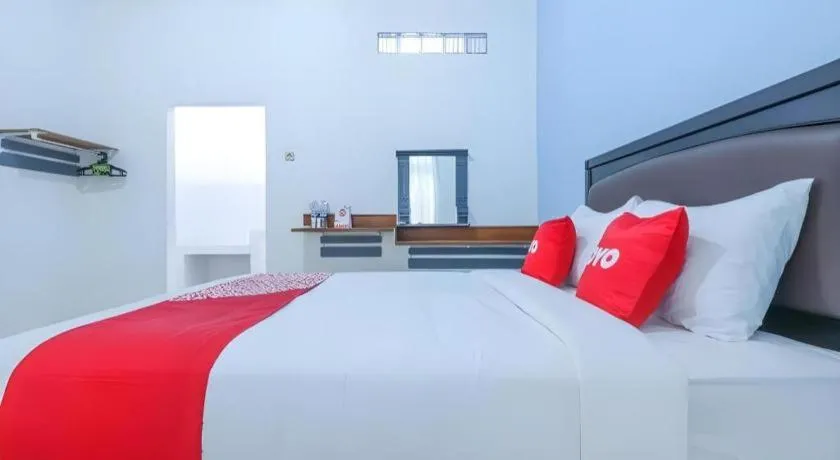 Bed in OYO 1755 De'balcon Accomodation Near Ngurah Rai Airport