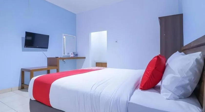 Bed in OYO 1755 De'balcon Accomodation Near Ngurah Rai Airport