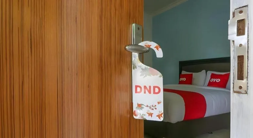 Bed in OYO 1755 De'balcon Accomodation Near Ngurah Rai Airport