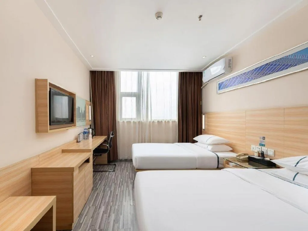 Bed in City Comfort Inn Zhanjiang Shimao Building Chikan Old Street