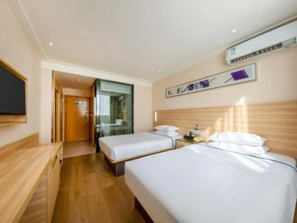 Bed in City Comfort Inn Zhanjiang Shimao Building Chikan Old Street