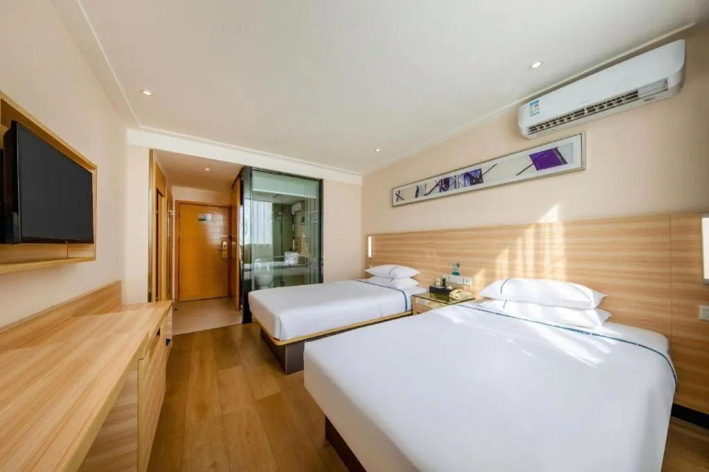 Bed in City Comfort Inn Zhanjiang Shimao Building Chikan Old Street