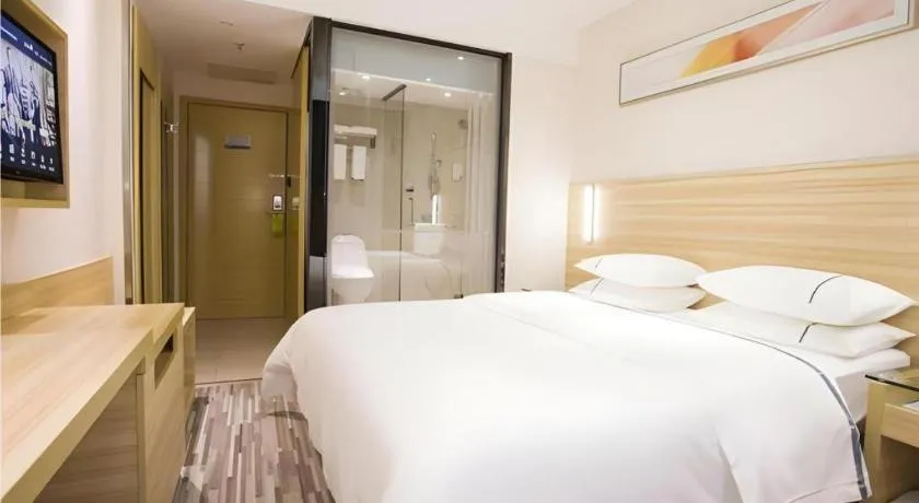 Bed in City Comfort Inn Zhanjiang Shimao Building Chikan Old Street