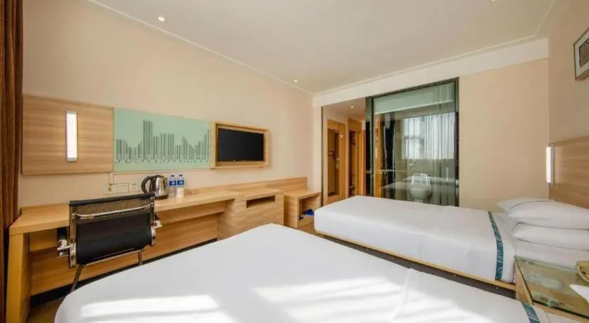 Bed in City Comfort Inn Zhanjiang Shimao Building Chikan Old Street