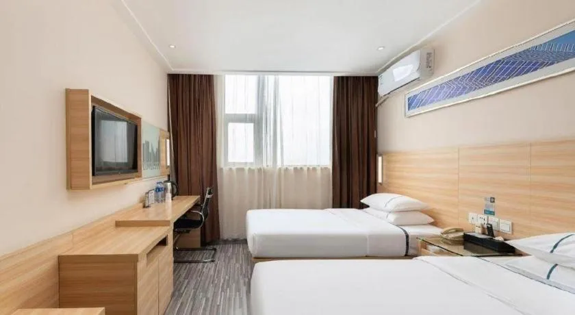 Bed in City Comfort Inn Zhanjiang Shimao Building Chikan Old Street