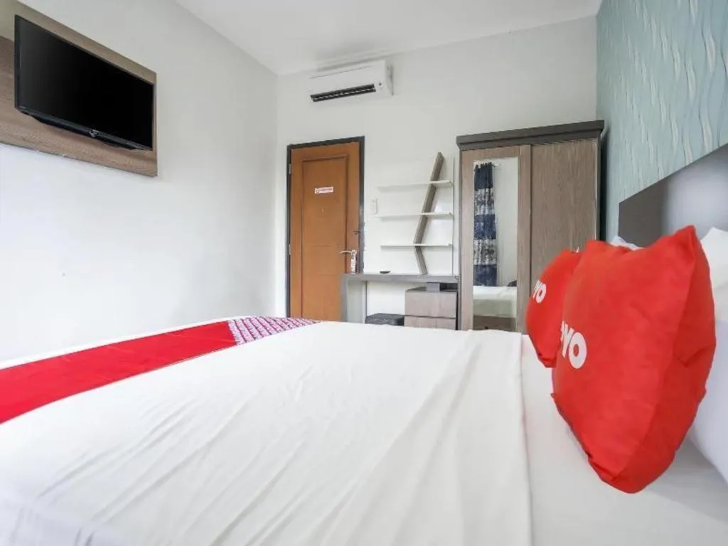 Bed in Hotel O Green Palm Kostel Syariah