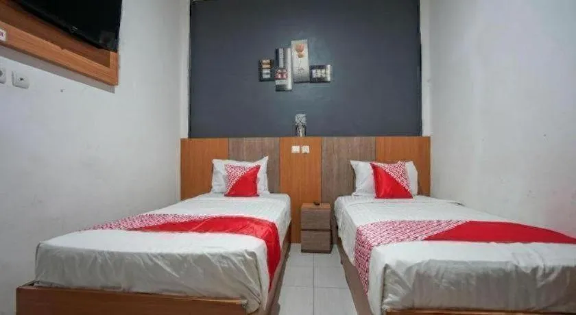 Bed in Hotel O Green Palm Kostel Syariah