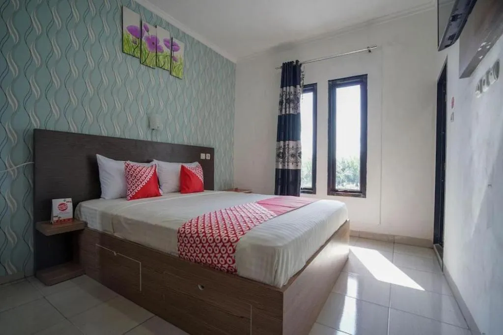 Bed in Hotel O Green Palm Kostel Syariah