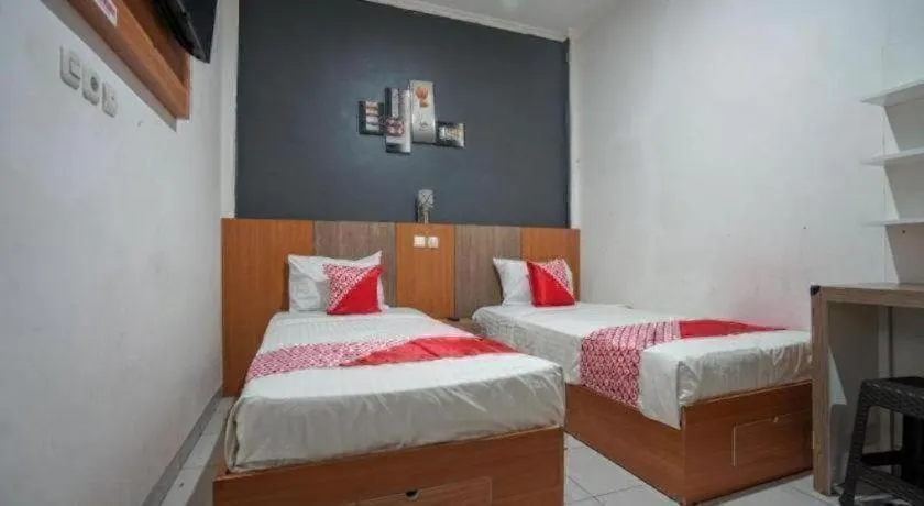 Bed in Hotel O Green Palm Kostel Syariah