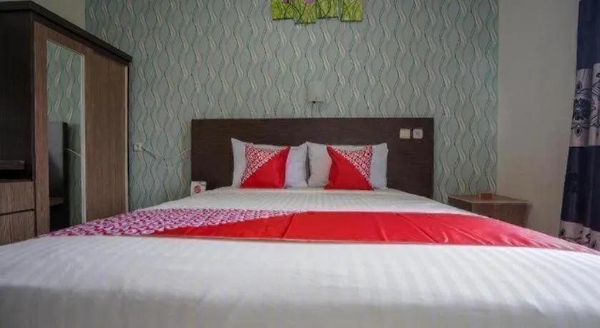Bed in Hotel O Green Palm Kostel Syariah