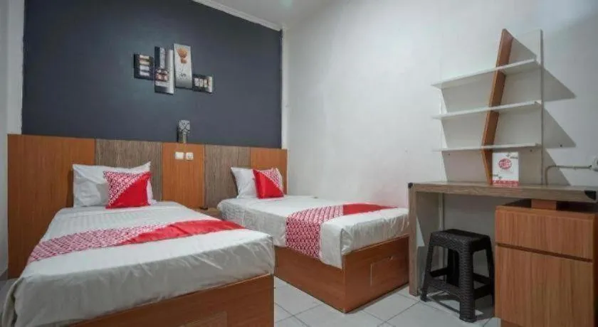 Bed in Hotel O Green Palm Kostel Syariah