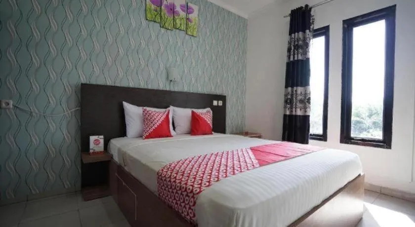 Bed in Hotel O Green Palm Kostel Syariah