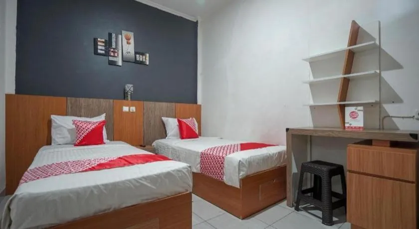 Bed in Hotel O Green Palm Kostel Syariah