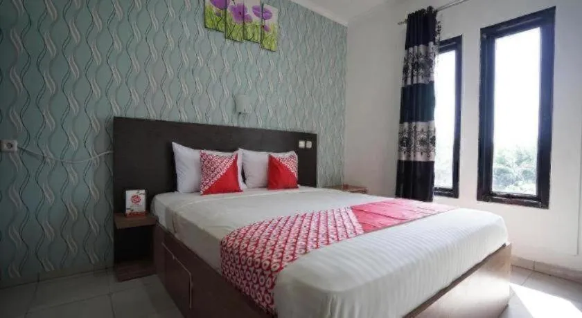 Bed in Hotel O Green Palm Kostel Syariah